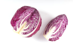 Purple cabbage isolated on white background. Red cabbage slice isolated on white background.